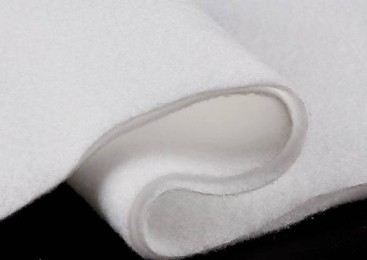 Production process of non-woven materials for disposable sanitary products